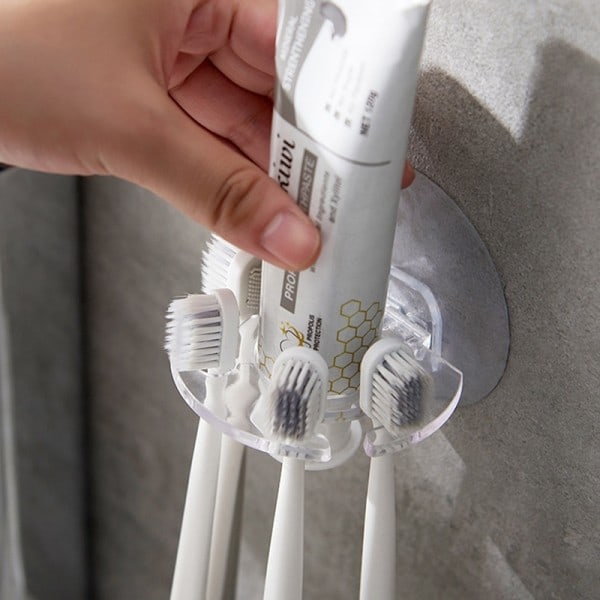 Vägg fäste tandkräm dispenser tandborste hållare förvaring pressare rakapparat hållare badrum hyllor