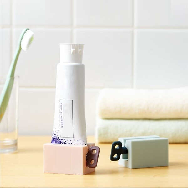 Tandkräm Dispenser Silicon Bottom Rullande Rymd Spara Squeezer