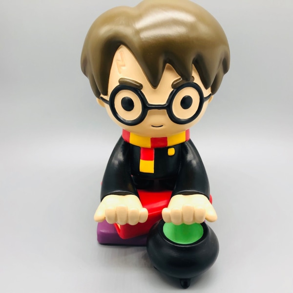Hieno peli – Tyylikäs puhelinteline: Puun inspiroima Humanoidi-mobiiliteline ja peliohjaimen pidike Harry Potter