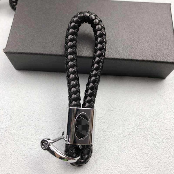 Stilren håndvevd nøkkelring med billogo - Elegant unisex-nøkkelholder for menn og kvinner Audi