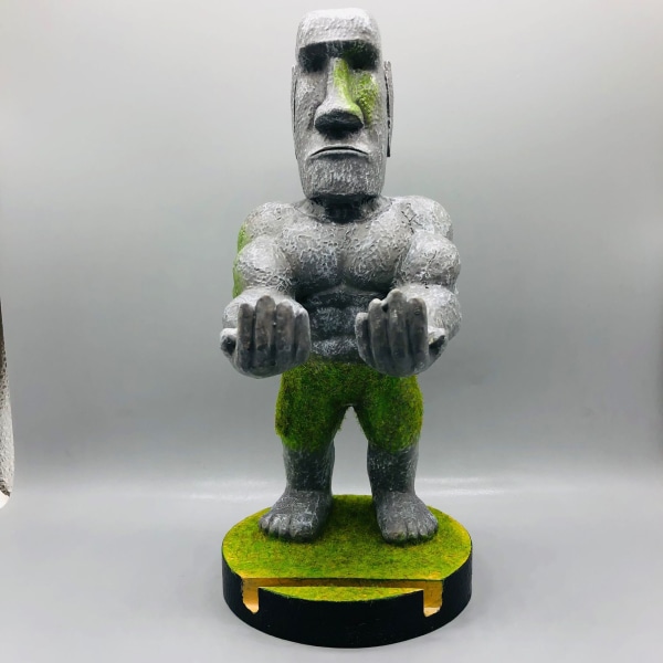 Hieno peli – Tyylikäs puhelinteline: Puun inspiroima Humanoidi-mobiiliteline ja peliohjaimen pidike Moai staty stå