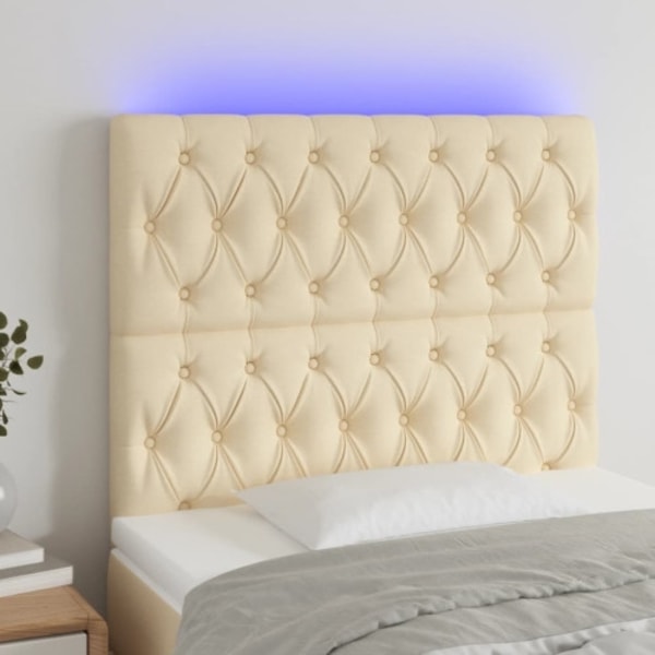 Sänggavel LED gräddvit 100x7x118/128 cm tyg