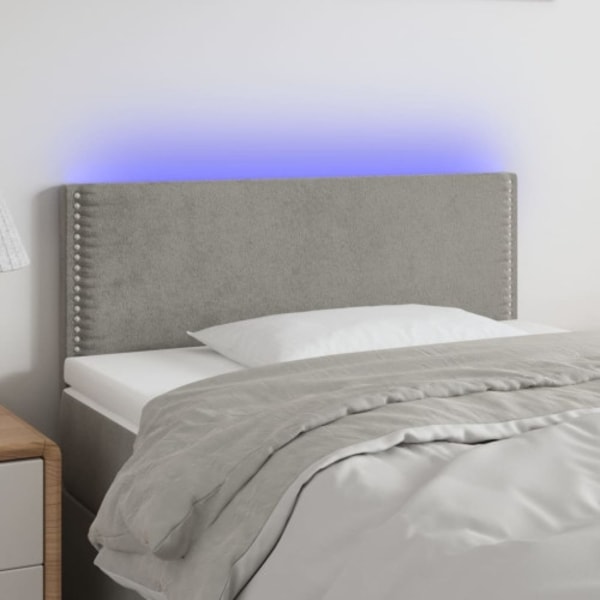 Sänggavel LED ljusgrå 90x5x78/88 cm sammet