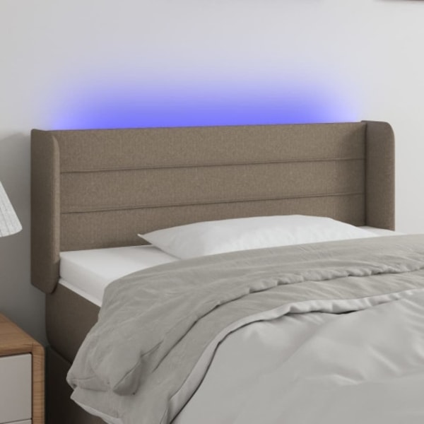 Sänggavel LED taupe 103x16x78/88 cm tyg