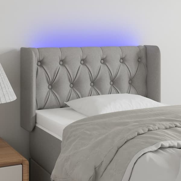 Sänggavel LED ljusgrå 83x16x78/88 cm tyg