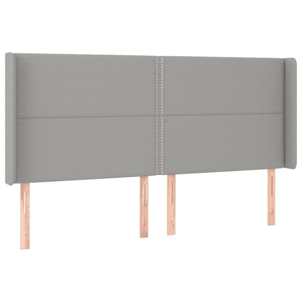 Sänggavel LED ljusgrå 203x16x118/128 cm tyg
