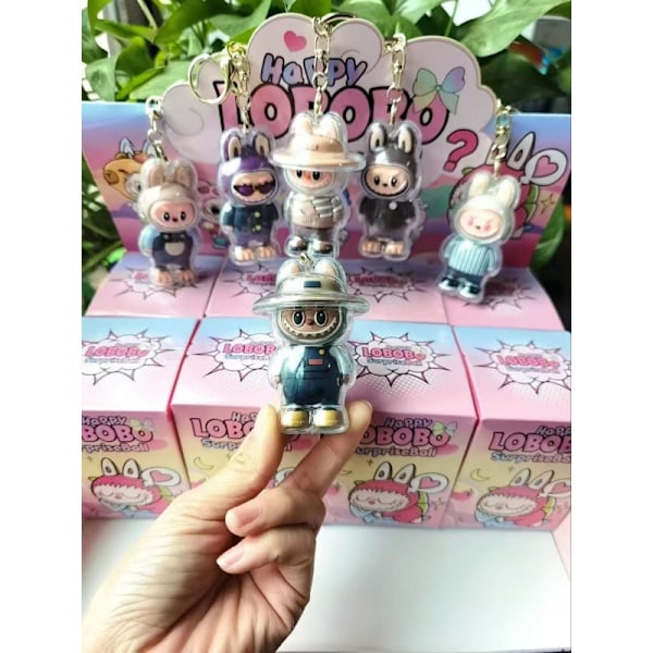 Blind Box Popmart Labubu Monster Lisa Seme Heart Macarrr Vinyl Base Series Modell Leksak Dekoration Födelsedagspresent[YJD] Keychain blind box