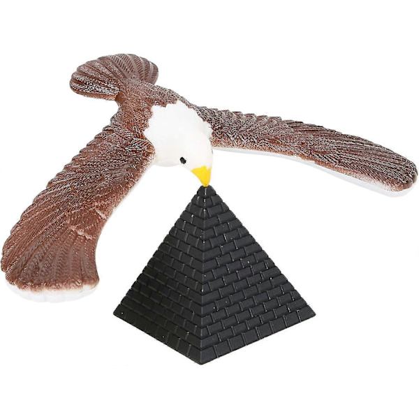 2 kpl tasapainottelevia lintuja, tasapainottava kotka siipivälillä ja pyramiditelineillä
