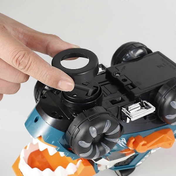 Dinosaurusauto Paristokäyttöinen Dinosauruskuorma-auto Valo- ja musiikkiominaisuuksilla Sähköinen Monster Truck Lasten Dinosaurus Esikoulun opetuslelu ST-4 orange