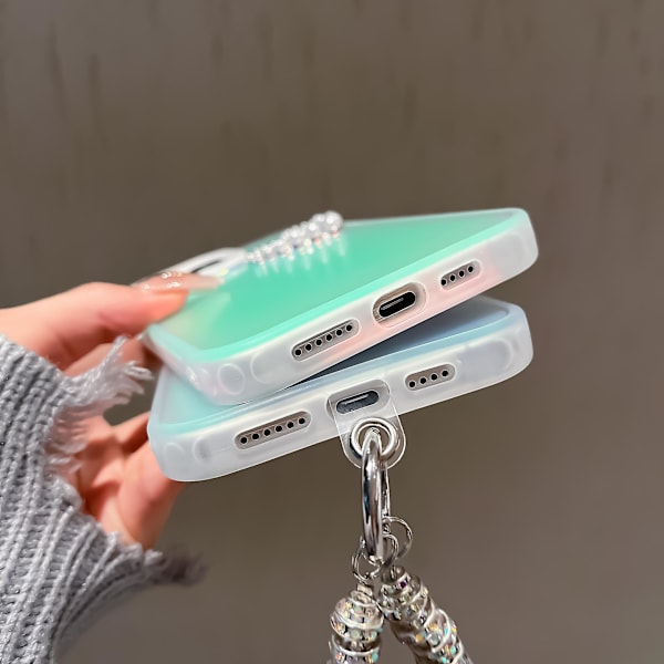 iPhone 13 Pro -mattakuori, laser-efekti, PC+TPU, helmiä, sydänpuhelin, suojakotelo käsihihnalla Transparent