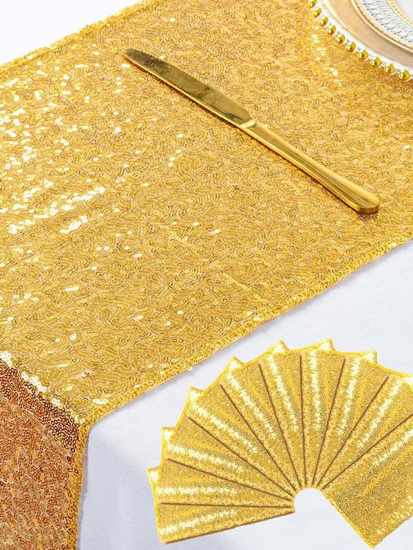 Bordlöpare i guld med fransar och paljetter