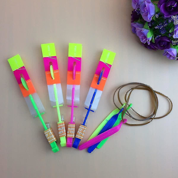 48-pack LED-upplysta pilformade raket-helikoptrar - Festlig leksaksgåva med elastisk band