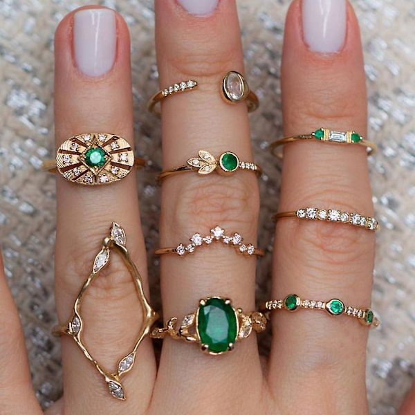 9-delat set med damring i ihåligt rombiskt/ovalt utförande med strass, staplingsbar knut- och midi-ring