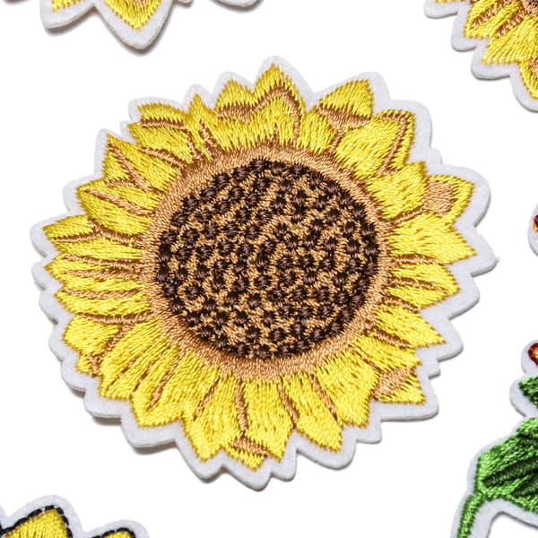 18 broderade solrospatchar, broderade applikationsdekaler
