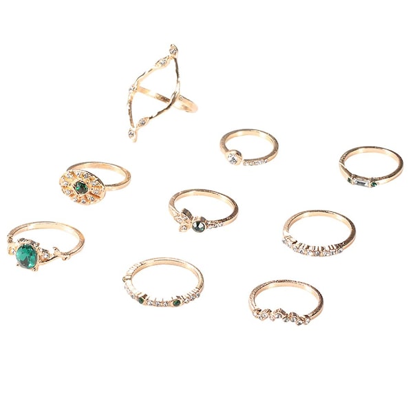9-delat set med damring i ihåligt rombiskt/ovalt utförande med strass, staplingsbar knut- och midi-ring