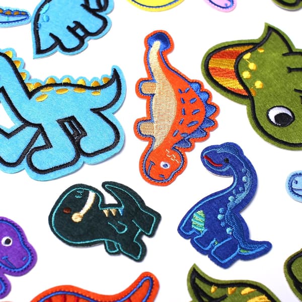 Sæt med 26 søde dinosaurformede strygemærker med broderi til