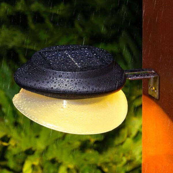 Solcellsdriven lampa, utomhusbelysning för innergård och trädgård, sensorstyrd LED-vägglampa, varm svart skallampa