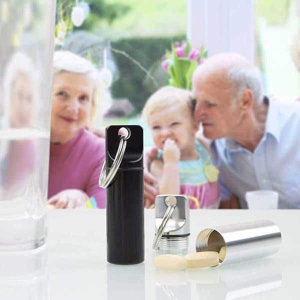 2 stycken (Svart+Silver) Liten Fickpillerask Nyckelring Mini