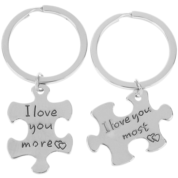 Ett par silvernycklar med texten \"I Love You More\" - Kreativa pusselnyckelringar för par - Present till älskare (utan kedja)