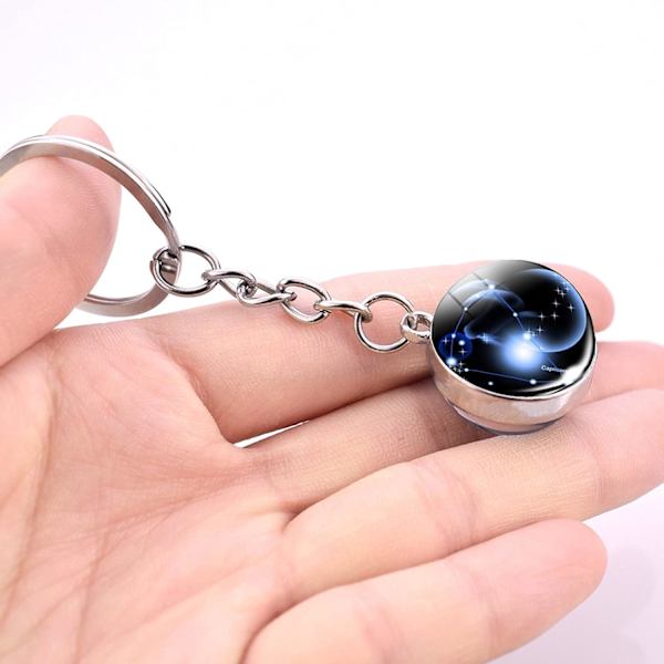 12 Constellation Glow In The ark Creative Galaxy nyckelring, - high quality D