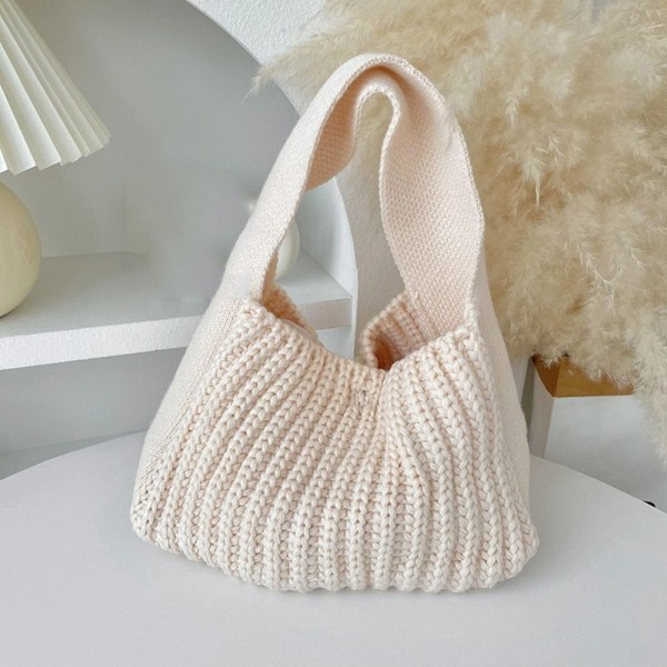 Stickad handväska Knot handledsväska APRIKOS - stock apricot
