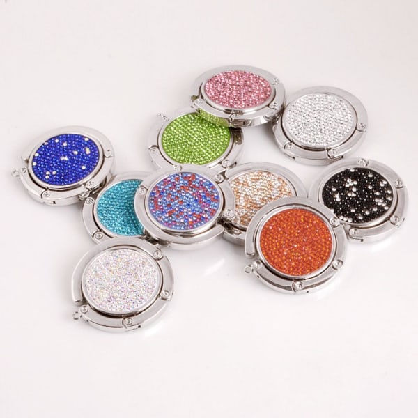 Pyöreät taitettavat pääsiäiskoukut Pöytälaukkuripustin MULTICOLOR - spot ale Multicolor