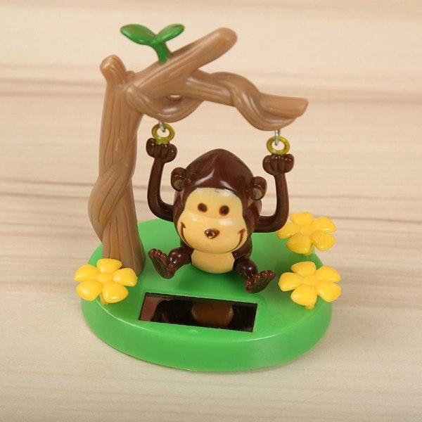 Aurinkoenergialla toimivat tanssilelut Monkey Swinging Dancer Toy Car - spot-myynti