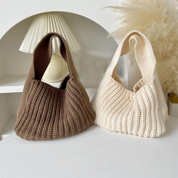 Stickad handväska Knot handledsväska APRIKOS - stock apricot