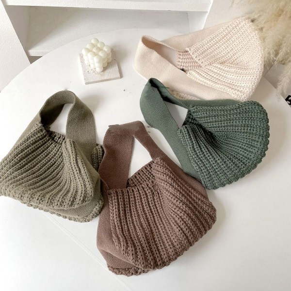 Stickad handväska Knot handledsväska APRIKOS - stock apricot