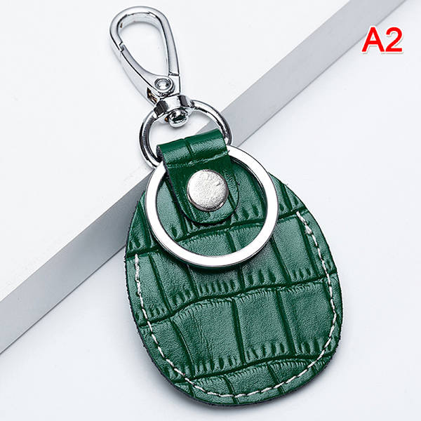 Kotelo Apple Airtagsille PIK Magnet Keychain Nahkakansi C - spot-myynti Dark green