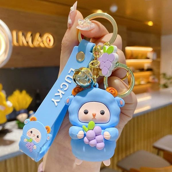 Söpö avaimenperä joululahja - Uusi vuosi Kawaii lammas avaimenperät poika tyttö laukku reppu Dark blue holding grapes