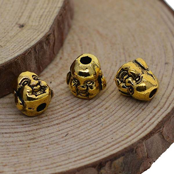 30 st antika leende 3d Buddha spiral distanspärlor i metall, guld