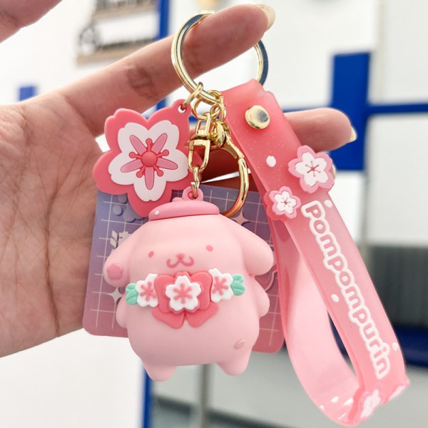 Rosa Sakura tegneserie nøkkelring, Kawaii søte nøkkelringer Bag Charm Wristlet Armbånd Melody