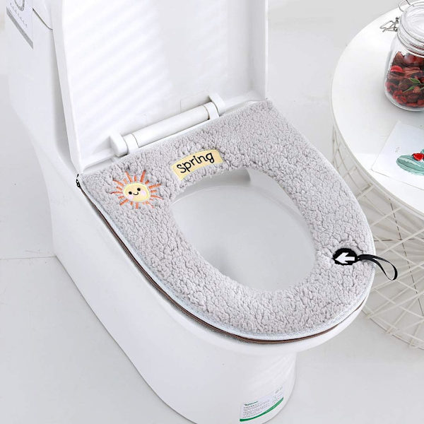 2 kappaletta yleismaailmallisia pehmeitä ja lämpimiä wc-istuimen pehmusteita ripustuslenkillä/