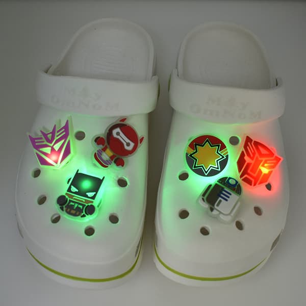 Crocs 9 Pack Shoe Charms - Mukauta Jibbitzillä Unisex-Aikuiset,