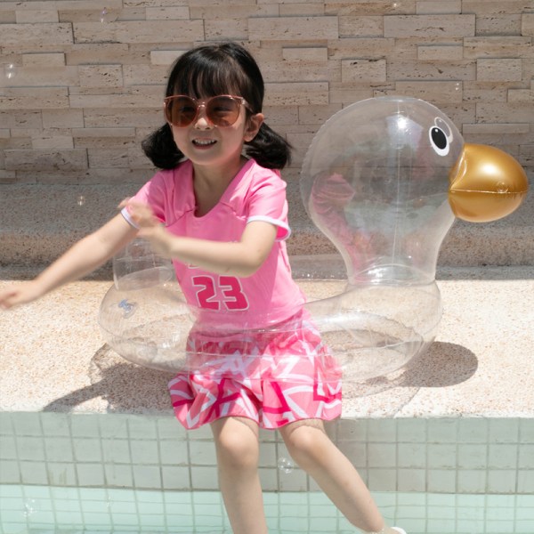 Oppblåsbar svømmering i form av en gjennomsiktig and for barn