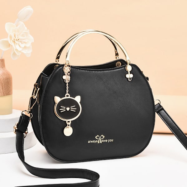 Dammode Handväska Liten Crossbody Väska Flickor Dam Rund Axelväska PU Läder Crossbody Väska Söt Handväska Plånbok med Katt Hänge (Svart)