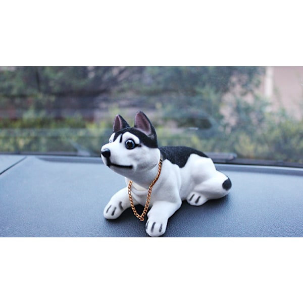 Husky-koirat pään ravistava koiran lelu auton kojelaudan pää koirat nyökkäävät auton kojelaudan pentu auton sisustukseen