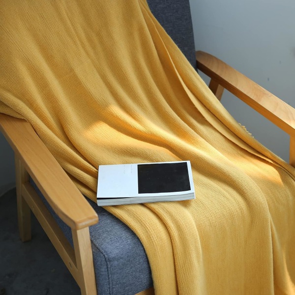 Stickad filt 130x240cm (gul), lätt och mjuk dekorativ vävd filt med tofsar. Perfekt för resor, soffa, säng, soffa