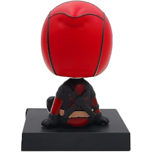 Hahmo bobblehead-nukke matkapuhelintelineellä/auton kojelaudan matkapuhelinteline punainen