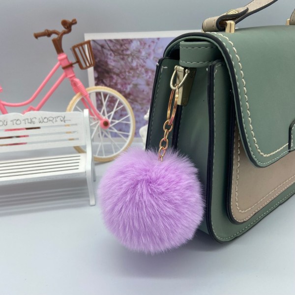 1 stk. nøglering med fluffy pom pom til bil taske charm (tilfældig farve)