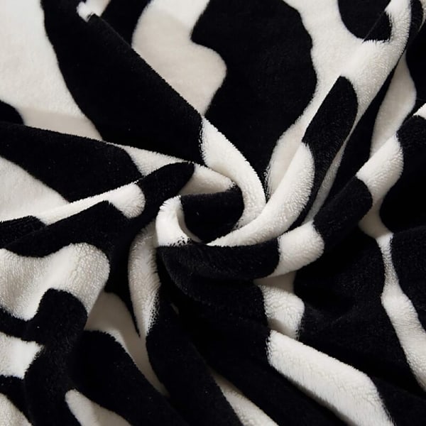 Zebra-mönstrad flanellfilt för soffa/säng (200 x 230 cm)