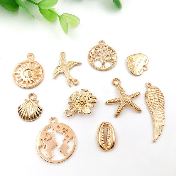 Mix 100 modeller av KC guld legering hänge smycken tillbehör armband halsband handgjorda diy smycken tillbehör material kit