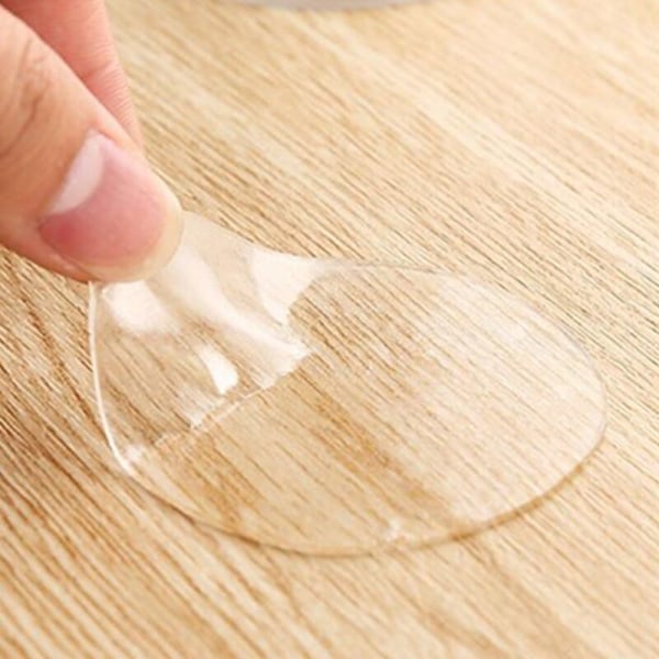 10 kappaleen setti kaksipuolisia seinätarroja, pyöreä silikonigeeli, läpinäkyvä ja tarttuva imukuppi, kiinnitettäväksi mihin tahansa. Ilmainen läpinäkyvä koko (7,5 cm)