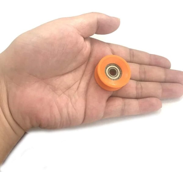 Förpackning med 5 6 x 30 x 13 mm Kullagerhjul med U-spår - Orange