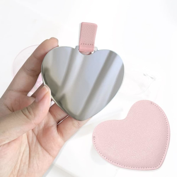 Ruostumattomasta teräksestä valmistettu kompakti peili, sydämenmuotoinen särkymätön tasku