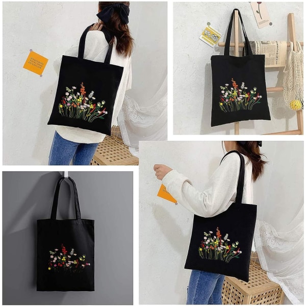 Svart broderikit i canvas med mönster och instruktioner Innehåller broderad väska med blommönster, broderiram i bambu, färgade trådar och Prosp