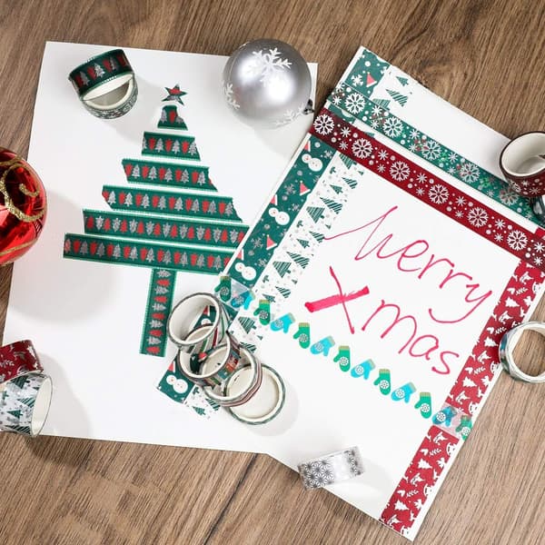 Julpapper - 12 rullar julfolietejpset med hjort, snöflingor, ränder