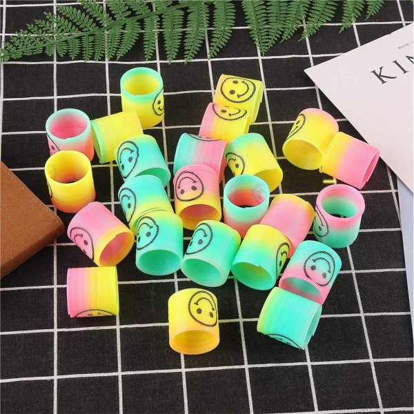 24 stk. Mini Rainbow Plastik Spring Legetøj Magiske Fjedre Legetøj til Sjov og Festartikler, Farverige