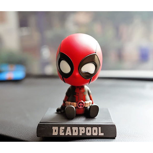 Hahmo bobblehead-nukke matkapuhelintelineellä/auton kojelaudan matkapuhelinteline punainen